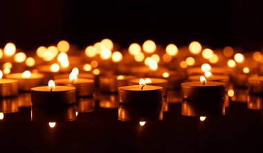 Burning candles with shallow depth of field clipart