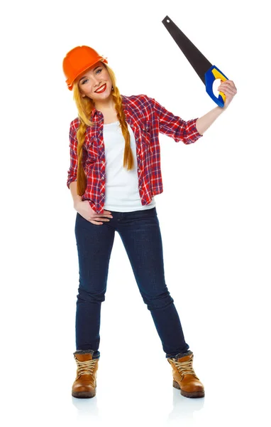 Young woman in helmet with a saw on a white background — Stock Photo, Image