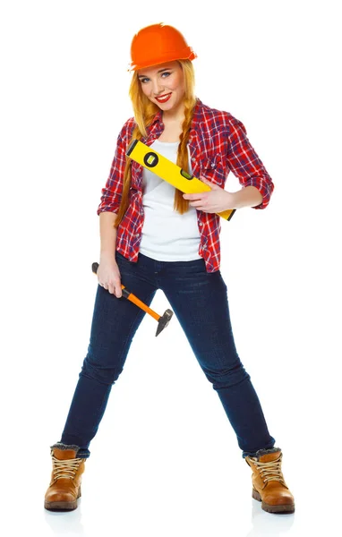 Young woman in helmet with the work tools on a white — Stock Photo, Image