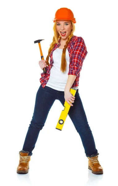 Young woman in helmet with the work tools on a white — Stock Photo, Image