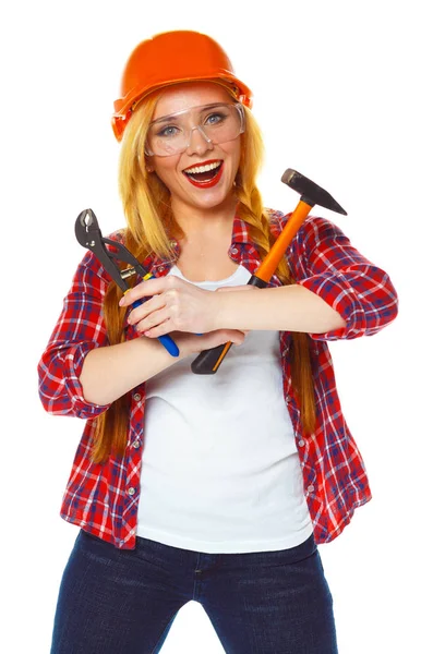 Young woman in helmet with the work tools on a white — Stock Photo, Image