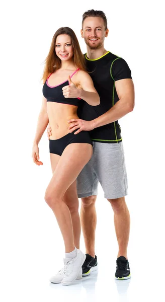Lekkoatletycznego mężczyzna i kobieta po fitness ćwiczenia z kciuki w górę na — Zdjęcie stockowe