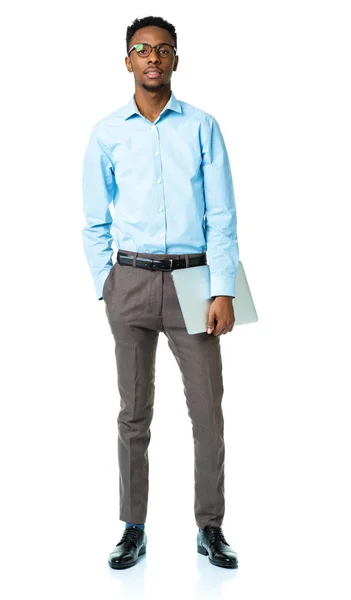 Happy african american college student standing with laptop on w — Stock Photo, Image