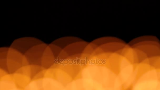 Bokeh set of burning candles in the dark — Stock Video