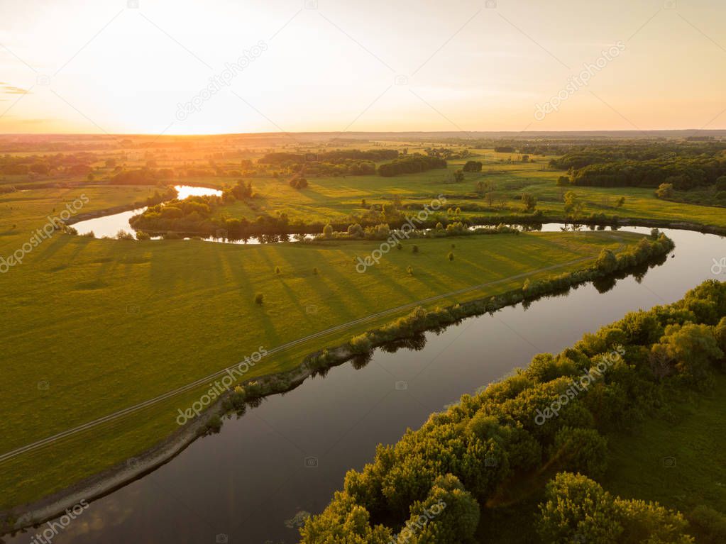 Top view of the Seim River (Ukraine), surrounded by trees and me