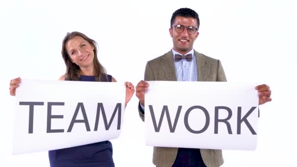 Two business partners posing in the studio with placards in hands. The concept of teamwork — Stock Video