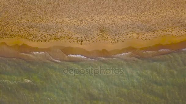 Top view of a deserted beach at sunset. Greek coast of the Ionian Sea — Stock Video