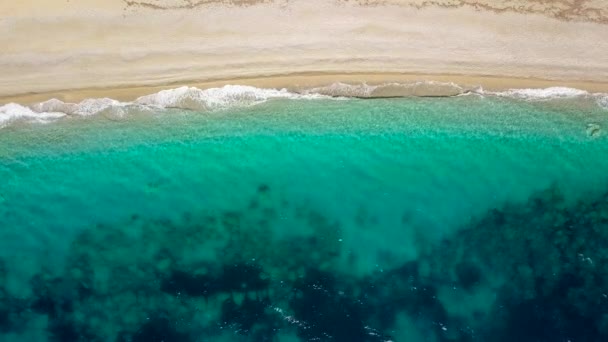 Aerial survey from a drone over the surface of the sea near shore — Stock Video