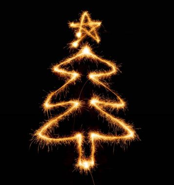 Noel ağacı üzerinde siyah bir maytap tarafından yapılan