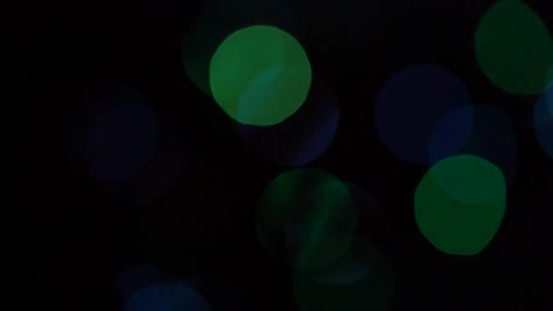 Christmas tree with colorful bokeh and christmas lights..Christmas and new year decoration. Blinking garland. — Stock Video