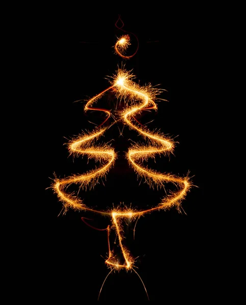 Christmas tree made by sparkler on a black — Stock Photo, Image