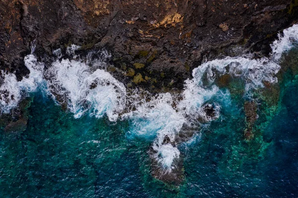 Top view of a deserted coast. Rocky shore of the island of Tener