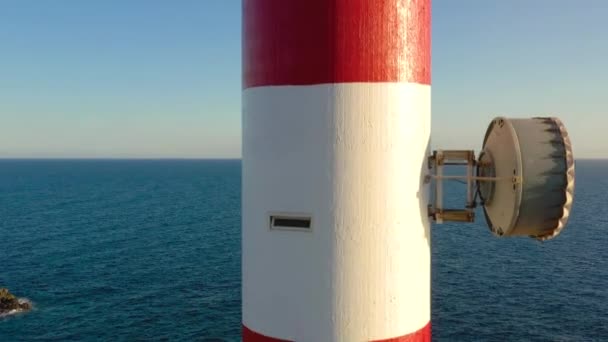 View from the height on the lighthouse closeup. Ocean on the background. Lighthouse Faro de Rasca, Tenerife, Canary Islands, Spain. — Stock Video