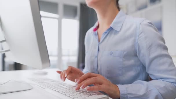 Female hands typing on a computer keyboard. Concept of remote work. — Stock Video