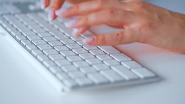 Female hands typing on a computer keyboard. Concept of remote work. — Stock Video