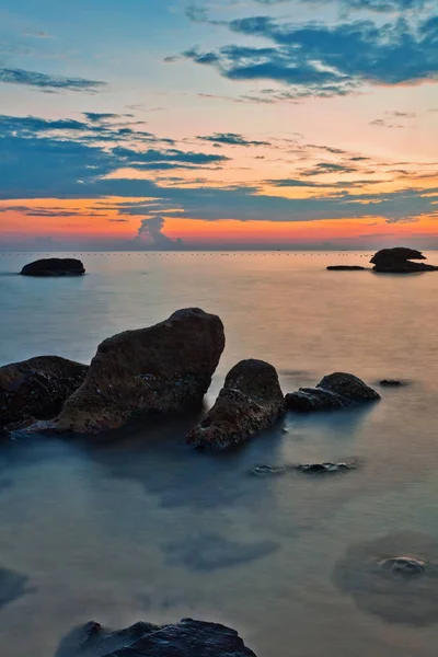 Strand bij zonsondergang — Stockfoto
