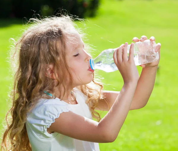 Child drinking water Royalty Free Stock Images