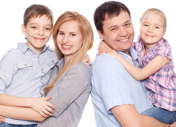 Famiglia felice a bianco — Foto Stock