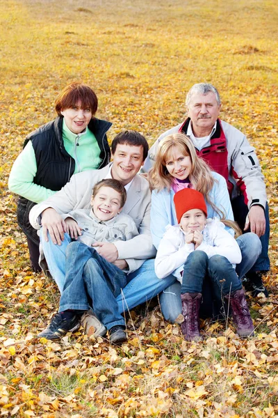 Big family in autumn park — Stock Photo, Image