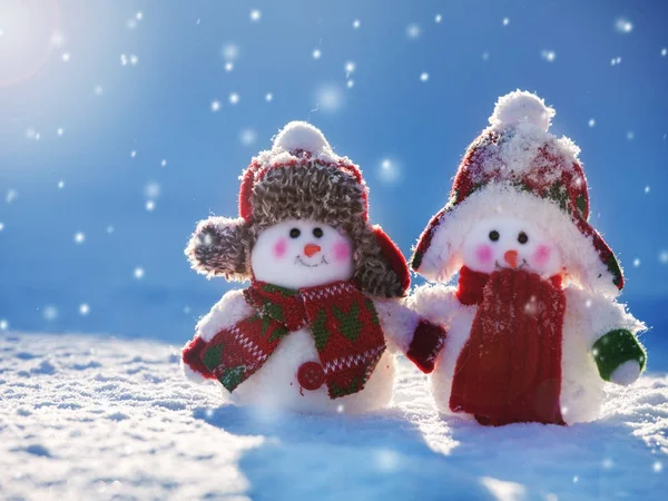 Snowmans on snow — Stock Photo, Image