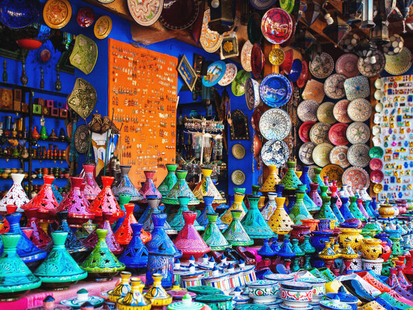 Colored Tajine, plates and pots out of clay on the market in Morocco