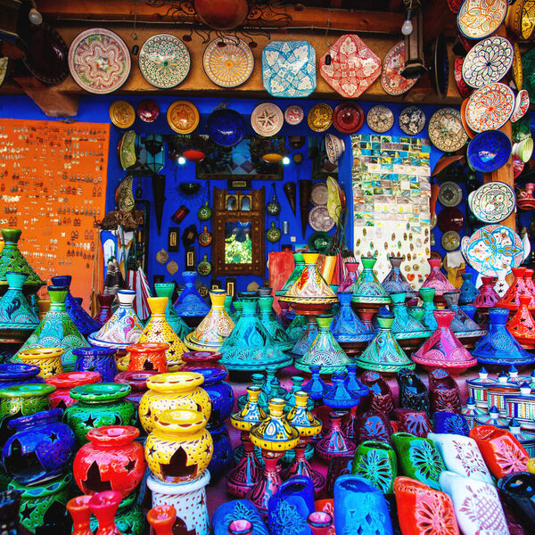 Colored Tajine, plates and pots out of clay on the market in Morocco