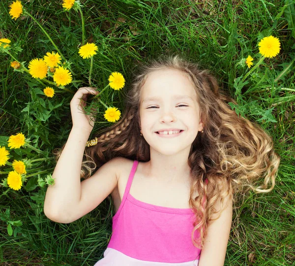 Child at summer with dandelion — Stock Photo, Image