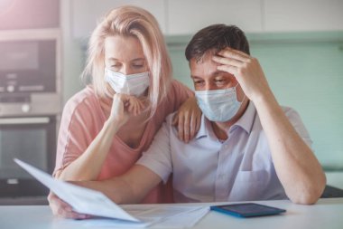 Couple worried about money problem during the pandemic coronavirus clipart