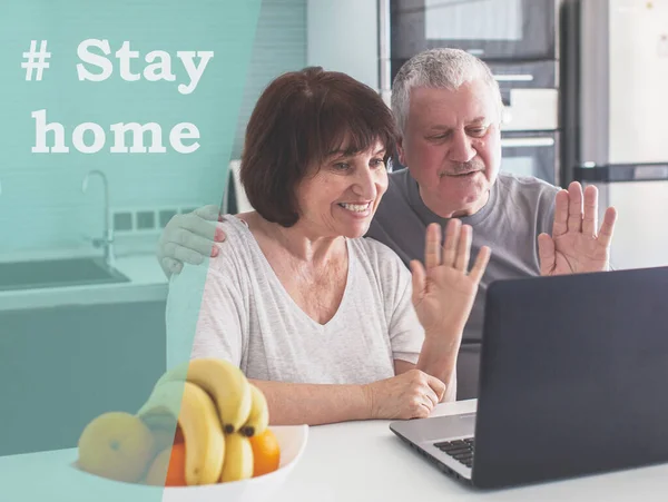 Elderly couple looking at computer during the pandemic coronavirus