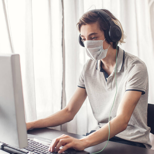 Young man in quarantine. Online distance learning