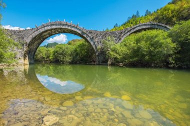 Kalogeriko bridge. Zagoria, Greece clipart