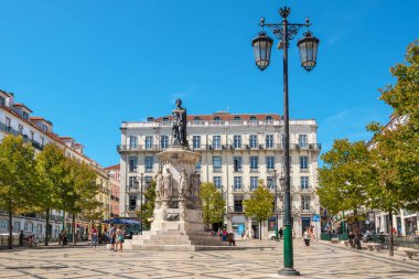 LISBON, PORTUGAL - SEPTEMBER 2, 2017: Monument of the poet Luis de Camoes on Luis de Camoes Square. Chiado District clipart