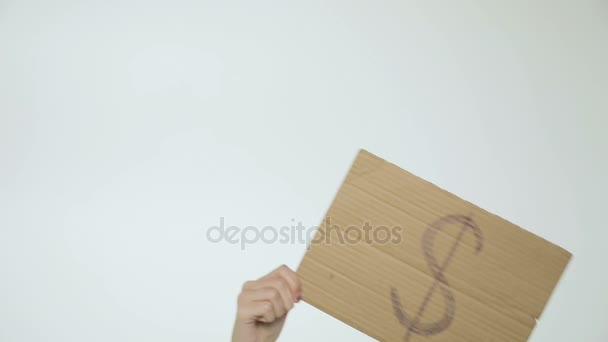 mains tient un signe avec un signe dollar 