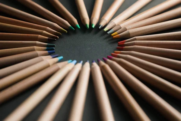 Color pencils background isolated in black — Stock Photo, Image