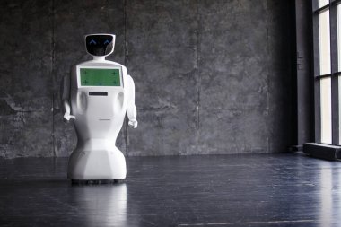 Robot man . Smart technology concept. Closeup of smart robots . Modern Robotic Technologies. The robot shows emotions. Futuristic humanoid clipart