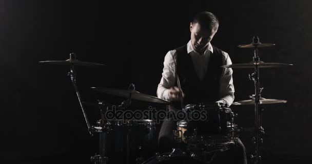 Drummer Plays Drums Kit. Drummer Hand Silhouette With Drumstick. Close up of Drummer Hand Playing Drum Plate on Rock Concert. Rock Band Performing on Stage — Stock Video