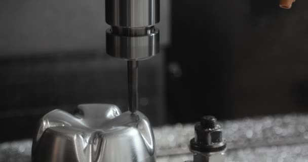 CNC milling machine makes some steel part on a factory — Stock Video