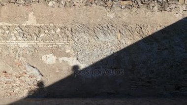 İspanyol şehir Malaga içinde yer alan kale sur duvar Alcazar de Gibralfaro içinde gölgeler var. Fenike muhafaza Gibralfaro Hill'e adını veren deniz feneri bulunan.