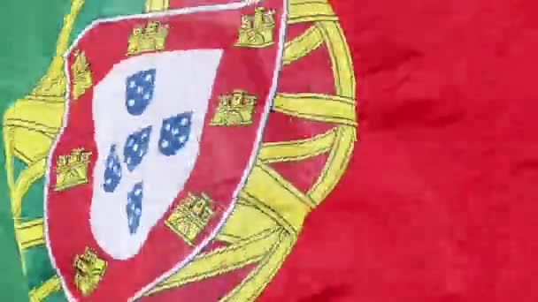 Flag of Portugal (Bandeira de Portugal) is the national flag of the Portuguese Republic. It is a rectangular bicolour with a field unevenly divided into green on the hoist, and red on the fly. — Stock Video