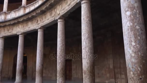 Patio of Palace of Charles V is Renaissance building in Granada, Andalusia, Spain, located on top of hill of Assabica, inside Nasrid fortification of Alhambra. Building stood roofless until 1957. — Stock Video