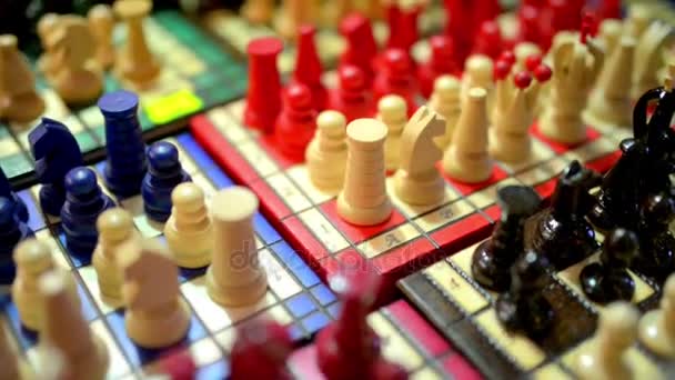 Multicolored carved wooden chess close-up. — Stock Video