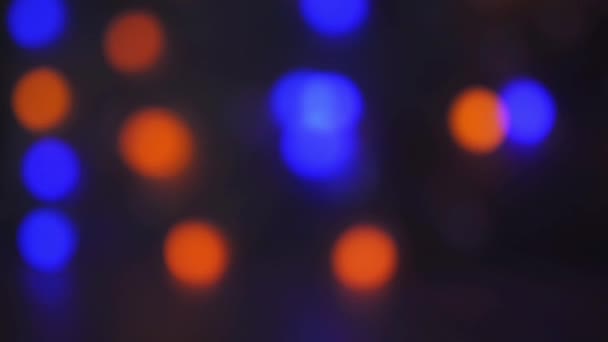 Red, green, blue lights on dark abstract background — Stock Video