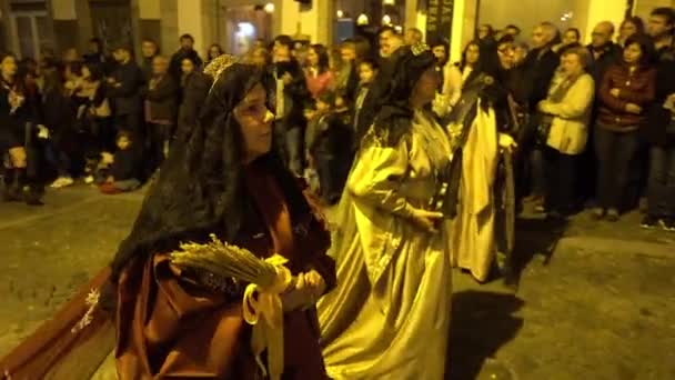 BRAGA, PORTUGAL - APRIL 14 217: Penance processions on streets of Braga, Portugal on Holy Week (Semana Santa) during last week of Lent before Easter. Annual tribute of Passion of Jesus Christ. — Stock Video
