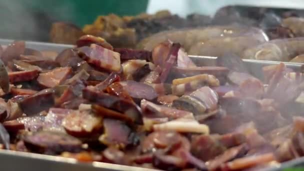 Chorizo (Spanish) or chourico (Portuguese) is type of pork sausage. Traditionally, it uses natural casings made from intestines, a method used since Roman times. — Stock Video