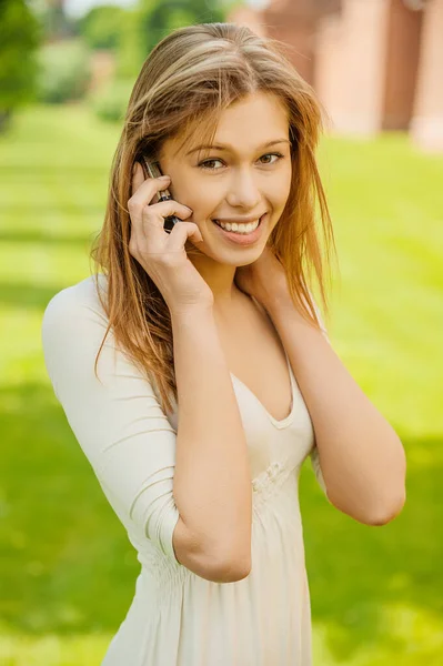 Beautiful Young Woman White Dress Speak Mobile Phone — Stock Photo, Image