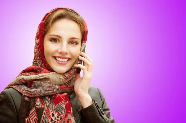 Young Beautiful Smiling Woman Motley Red Headscarf Talks Cellular Telephone — Stock Photo, Image