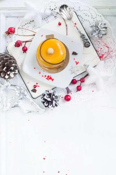 French mousse cake covered with yellow glaze — Stock Photo, Image