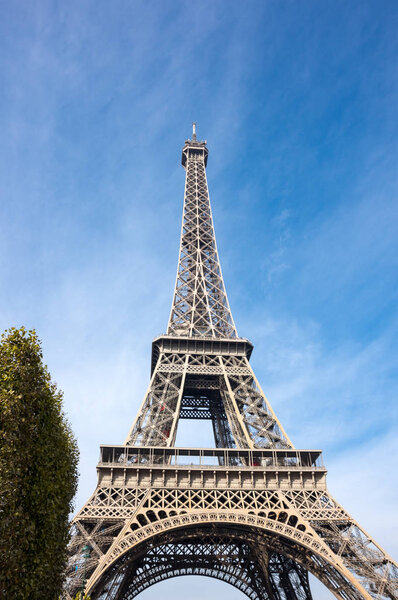 The Eiffel Tower is a wrought iron lattice tower on the Champ de Mars in Paris, France