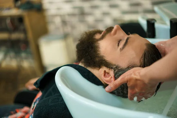 Customer in a barber shop — Stock Photo, Image