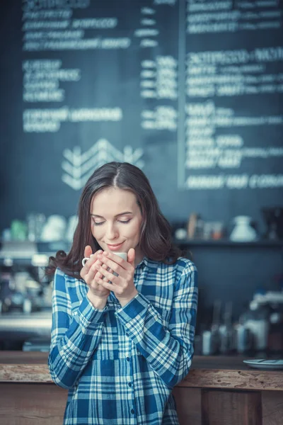 Drinking coffee indoors — Stock Photo, Image